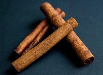 Cinnamon sticks on black