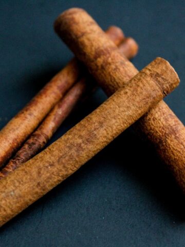 Cinnamon sticks on black