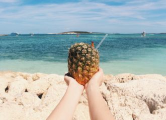 Beach in The Bahamas with a pineapple