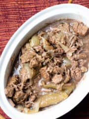 Seswaa in a crock pot with beef and onions.