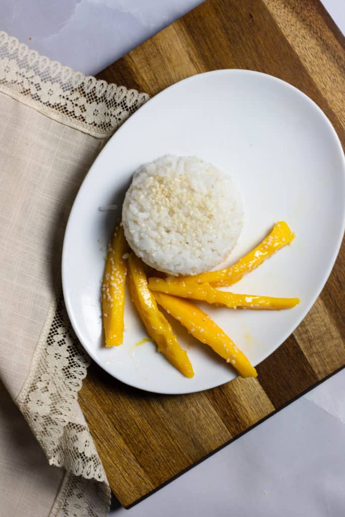 Plate of sticky rice with mango