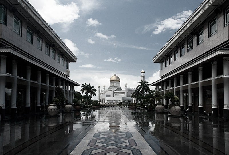 Grayscale photo of the mall in front of the Brunei mosque 