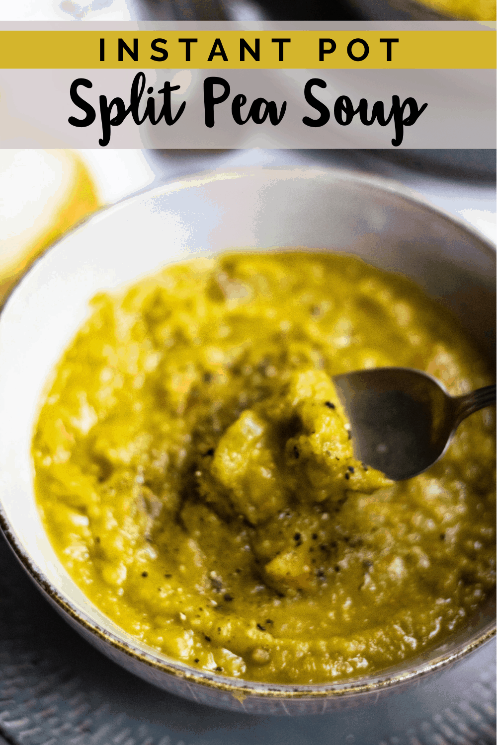 Instant Pot split pea soup being served in a bowl