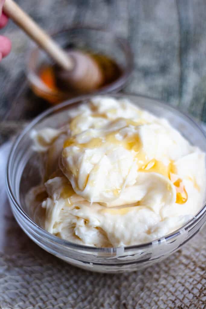 bowl of honey cream cheese frosting 
