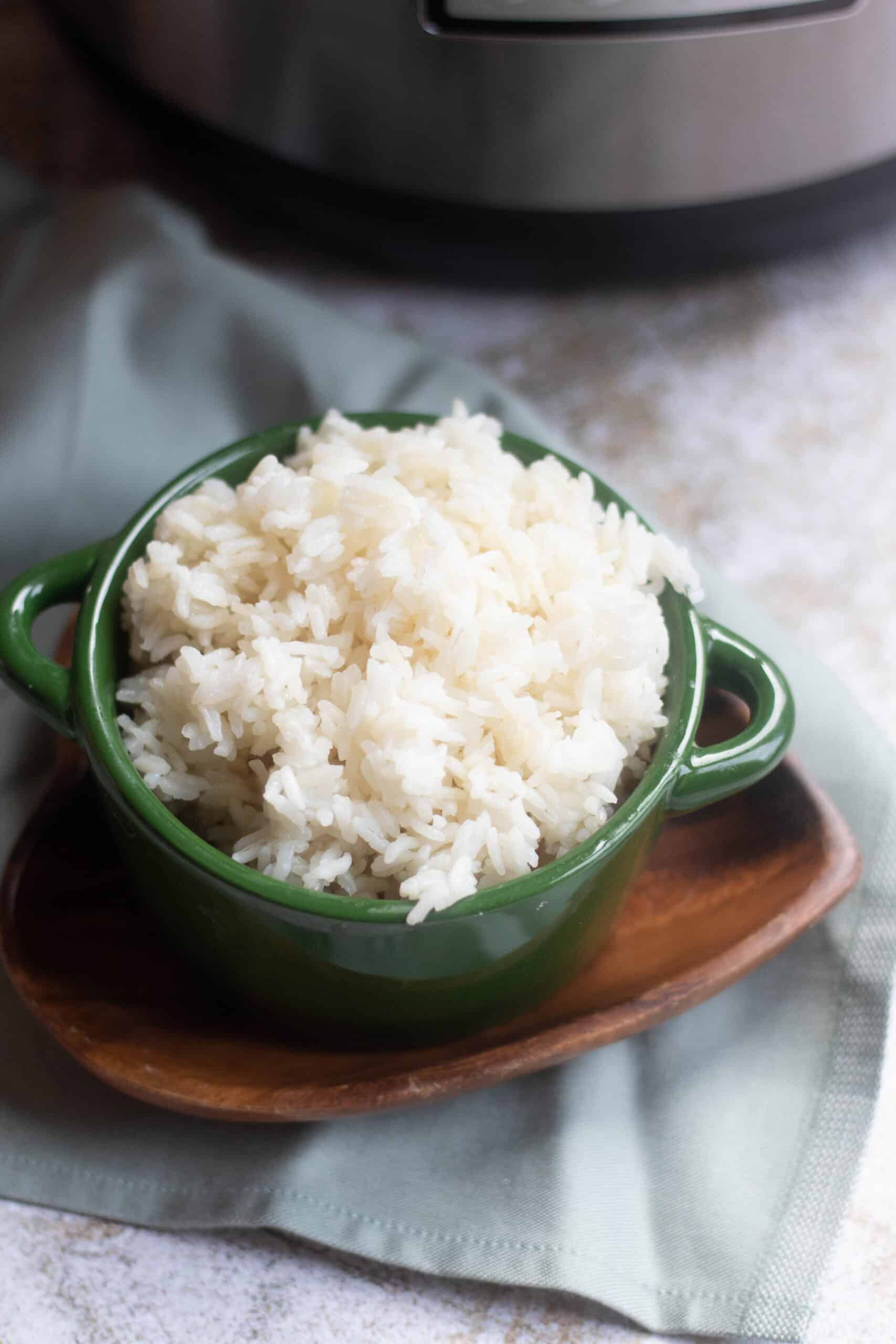 Fluffy rice next to instant pot