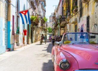 Cuban street with pink car