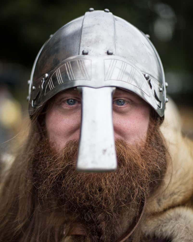 Face of a viking with a metal helmet