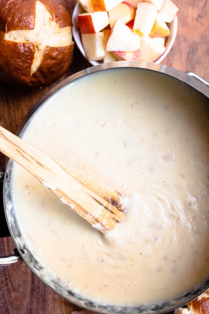 Melted cheese in a fondue pot