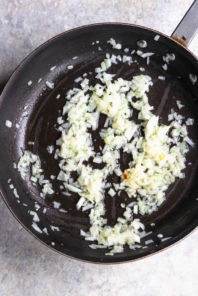 Frying pan with chopped onions