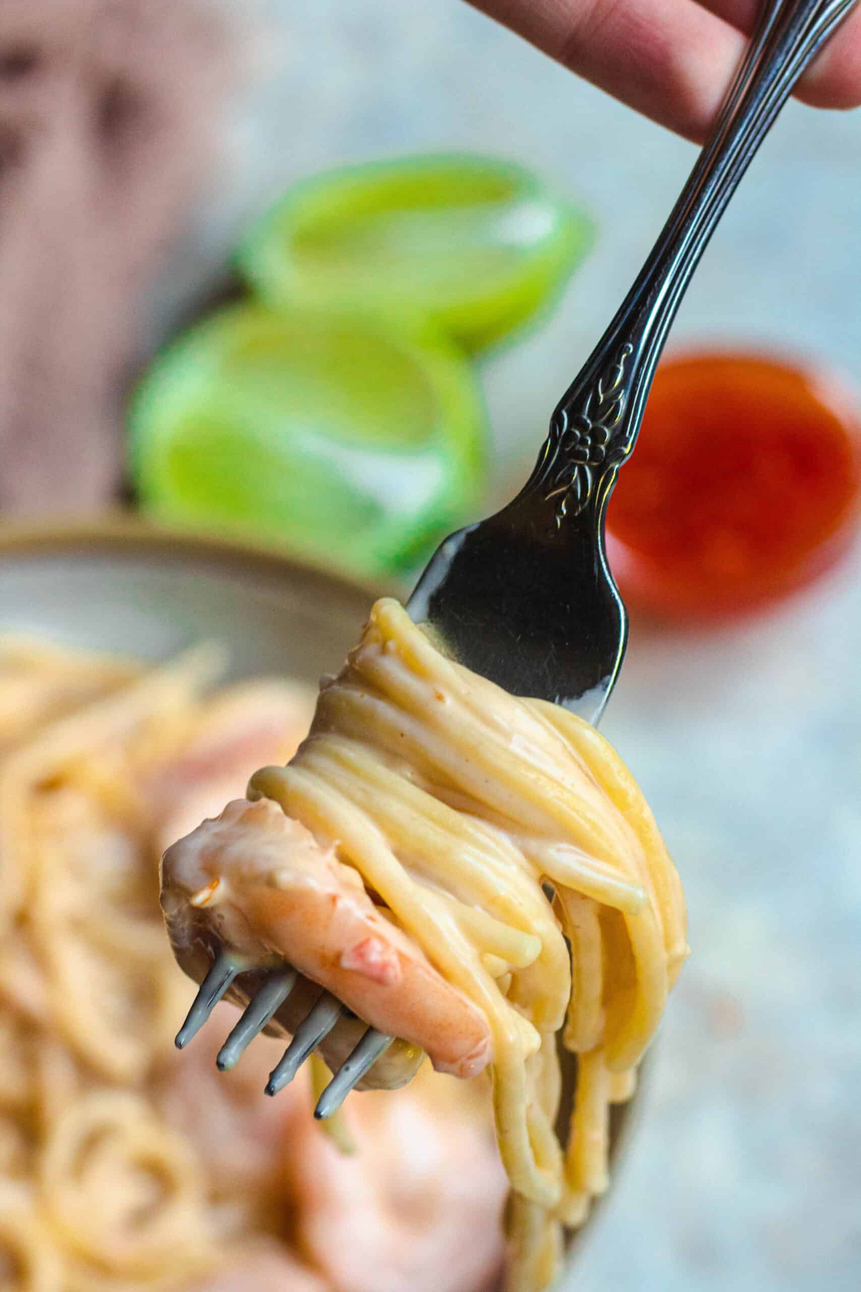 Bang Bang shrimp pasta twirled around a fork.