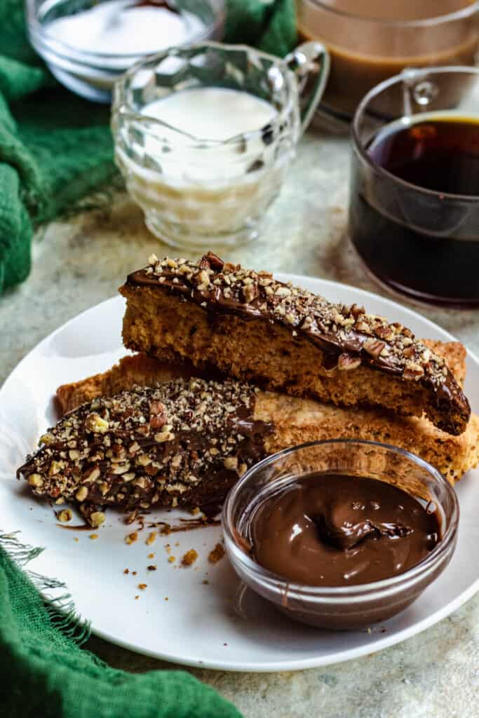 plate with chocolate covered Traditional italian biscotti 