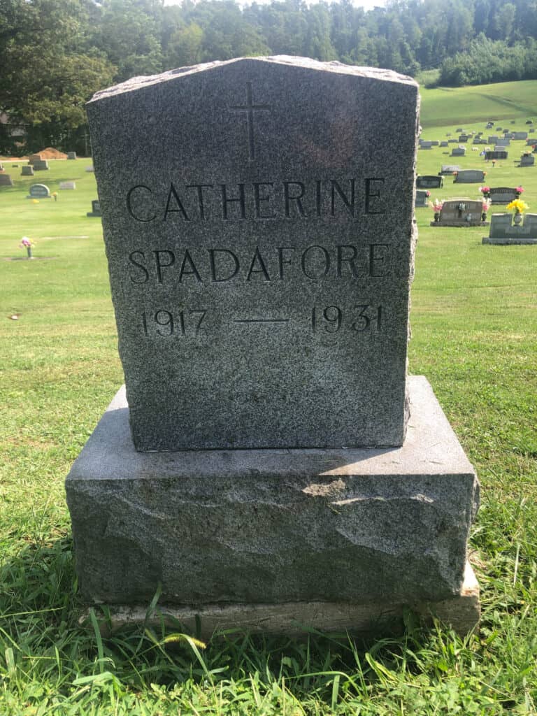 a headstone of Catherine Spadafore in a cemetery.