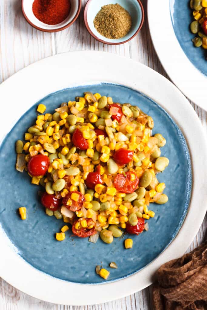 Pile of succotash on a plate