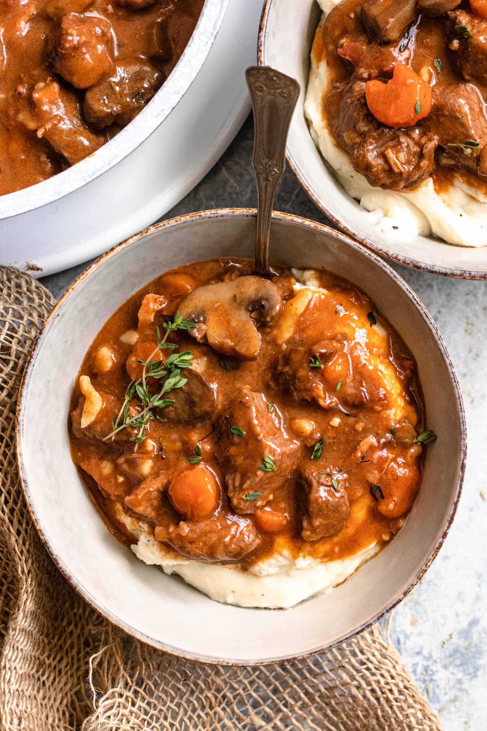 Beef bourguignon served over mashed potatoes. 