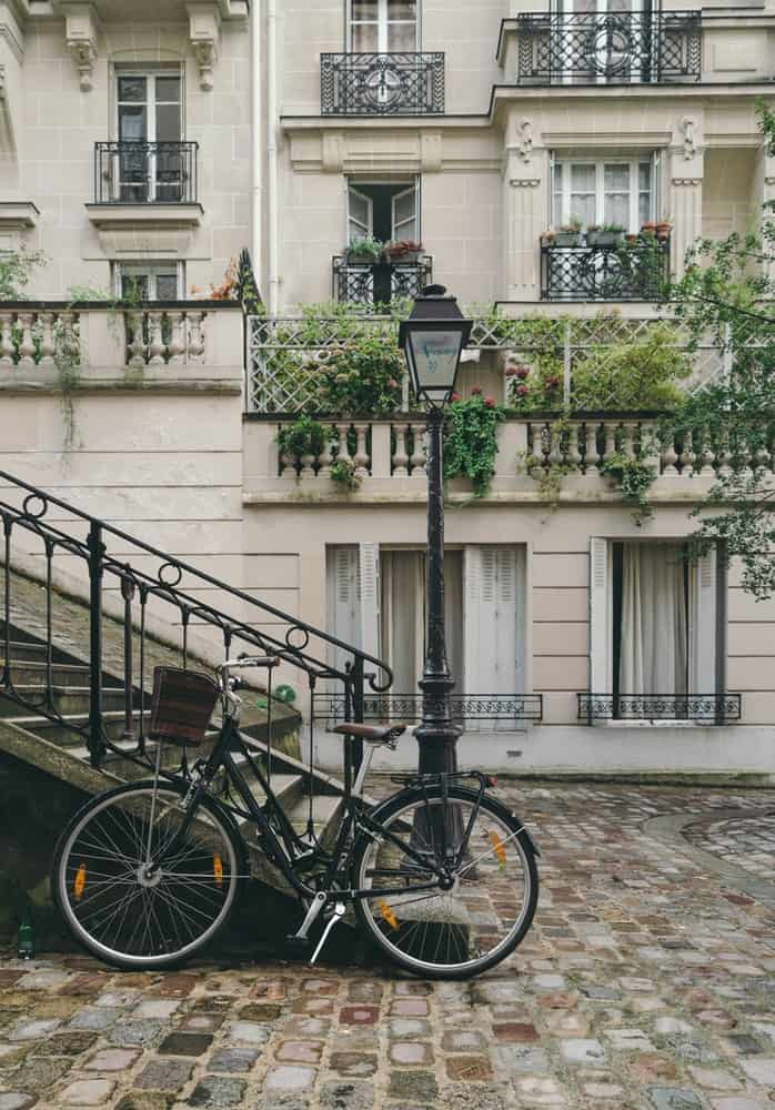 a beautiful house with a bike in front of it in france 