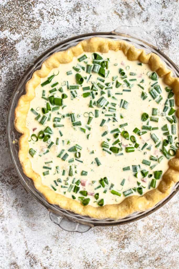 quiche with uncooked custard and fillings 