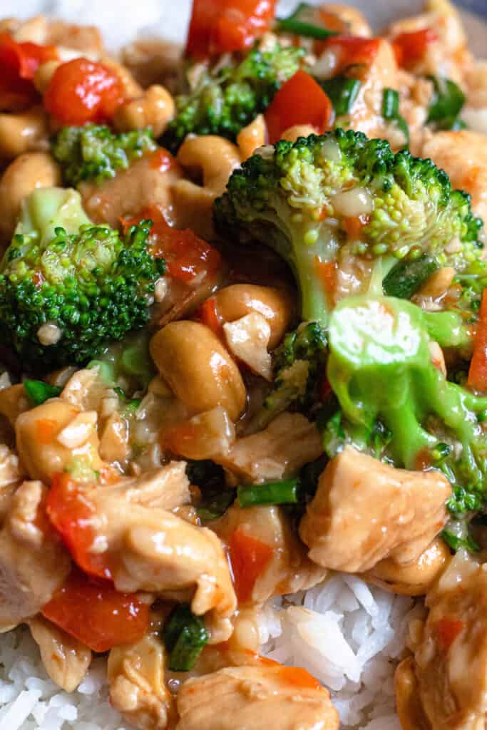 close up of chicken with broccoli and red pepper