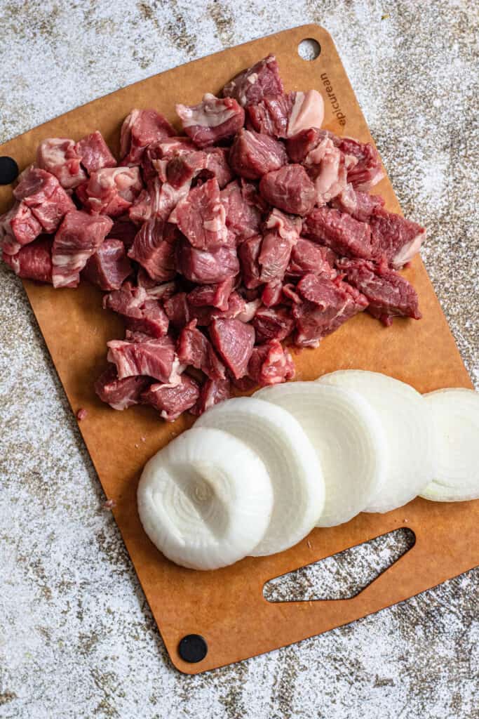 cubed steak and sliced onions