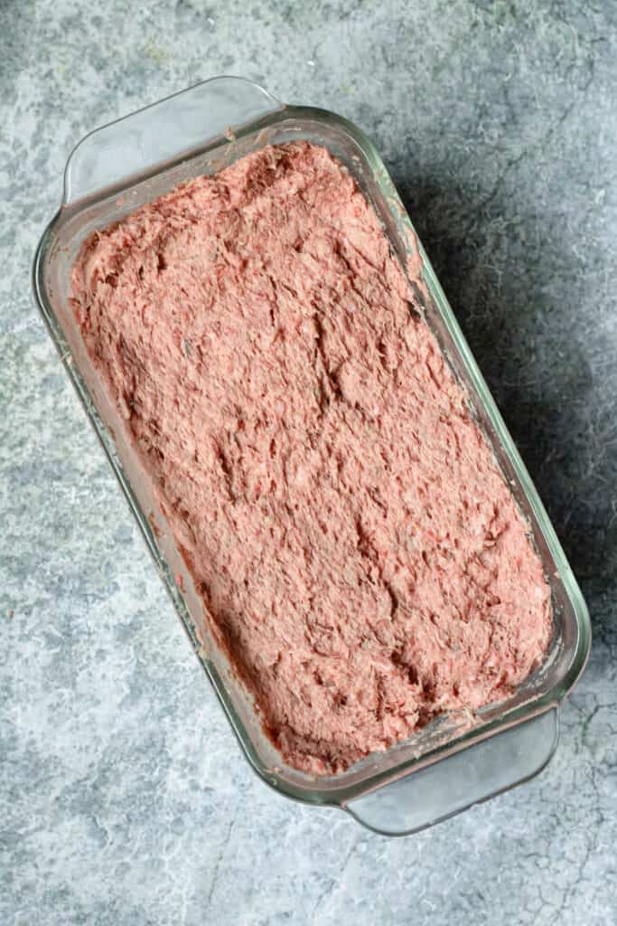 uncooked gyro meat in a loaf pan