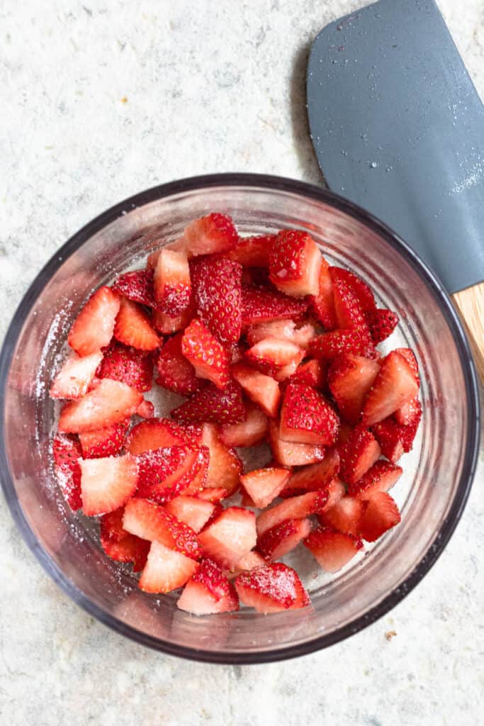 small bowl with strawberries and sugar