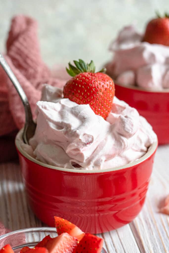 Small bowl with strawberries and cream 
