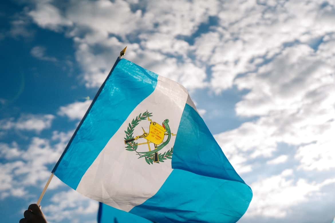 Guatemalan flag waving in the sky 
