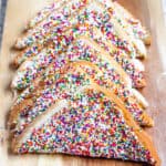 Half slices of fairy bread lined up against one another.