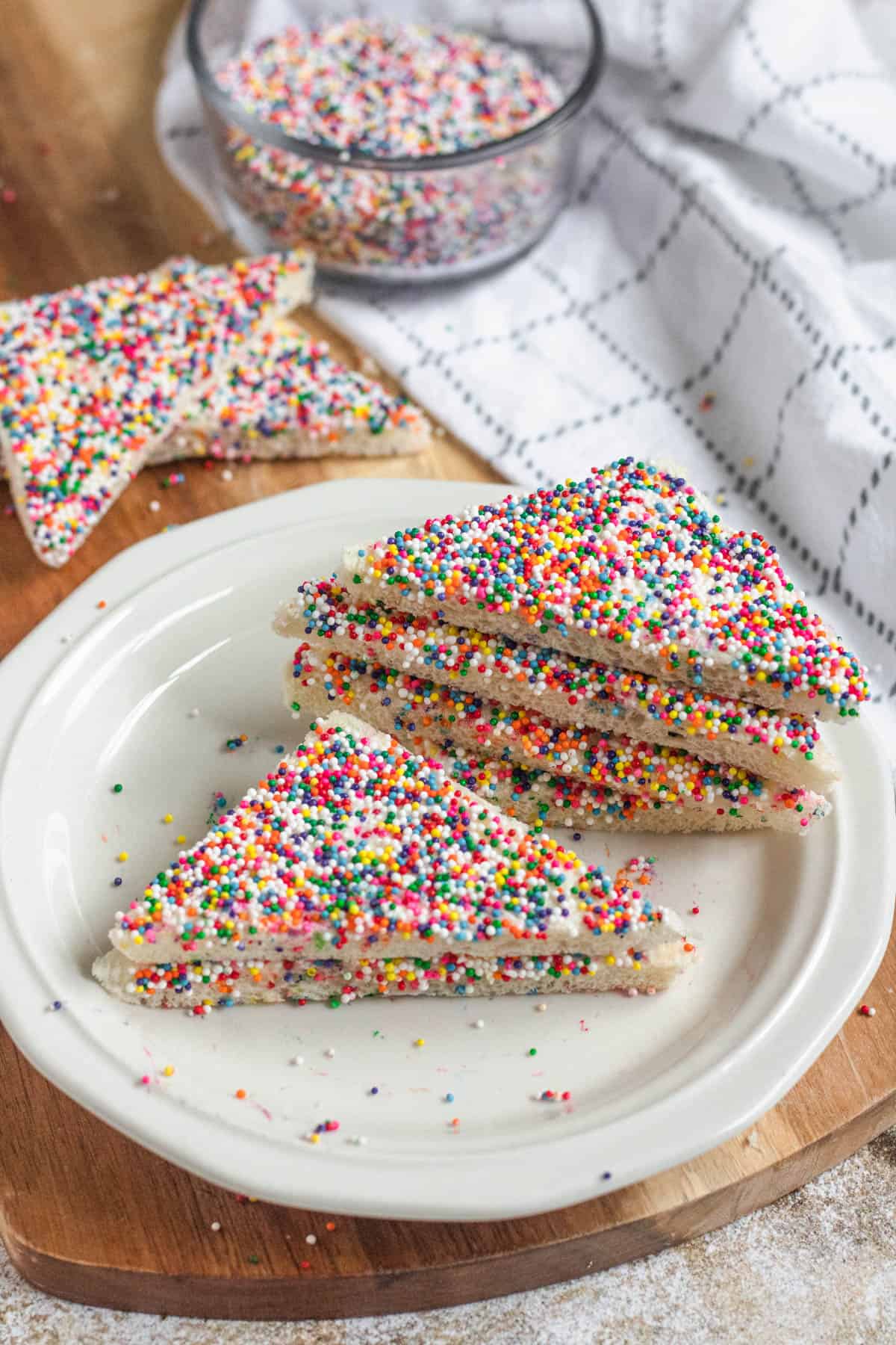 Fairy bread with crusts off on a plate