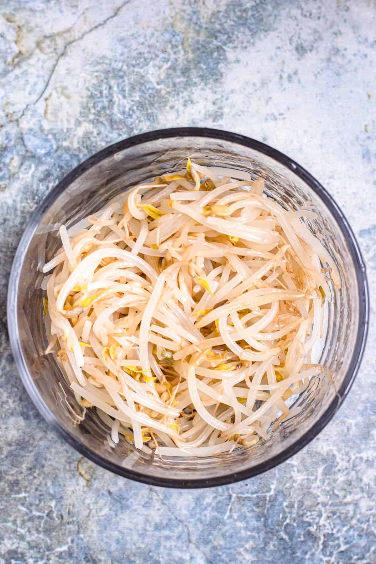 bowl with cooked soybean sprouts