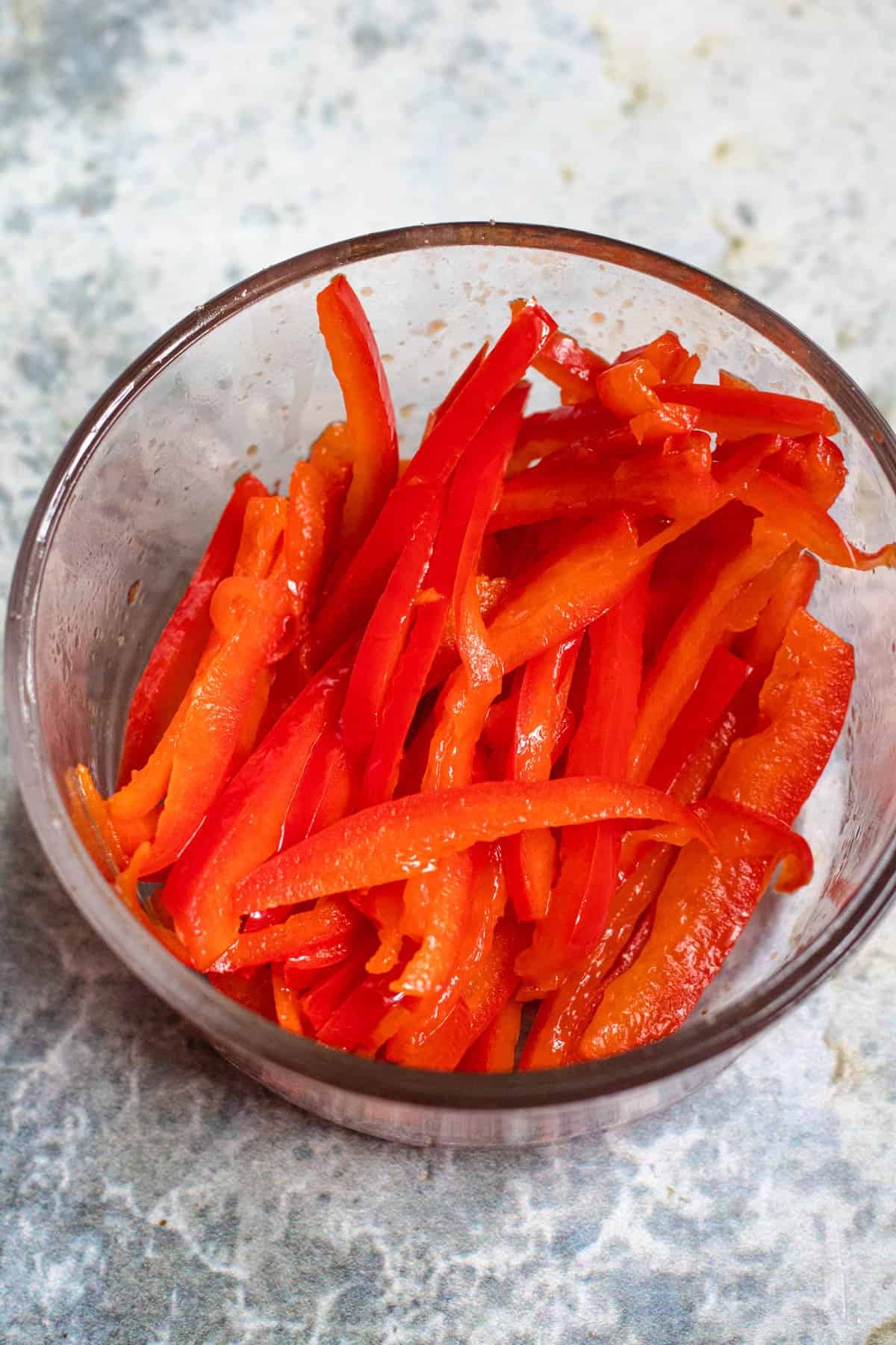 Bowl of cooked red peppers
