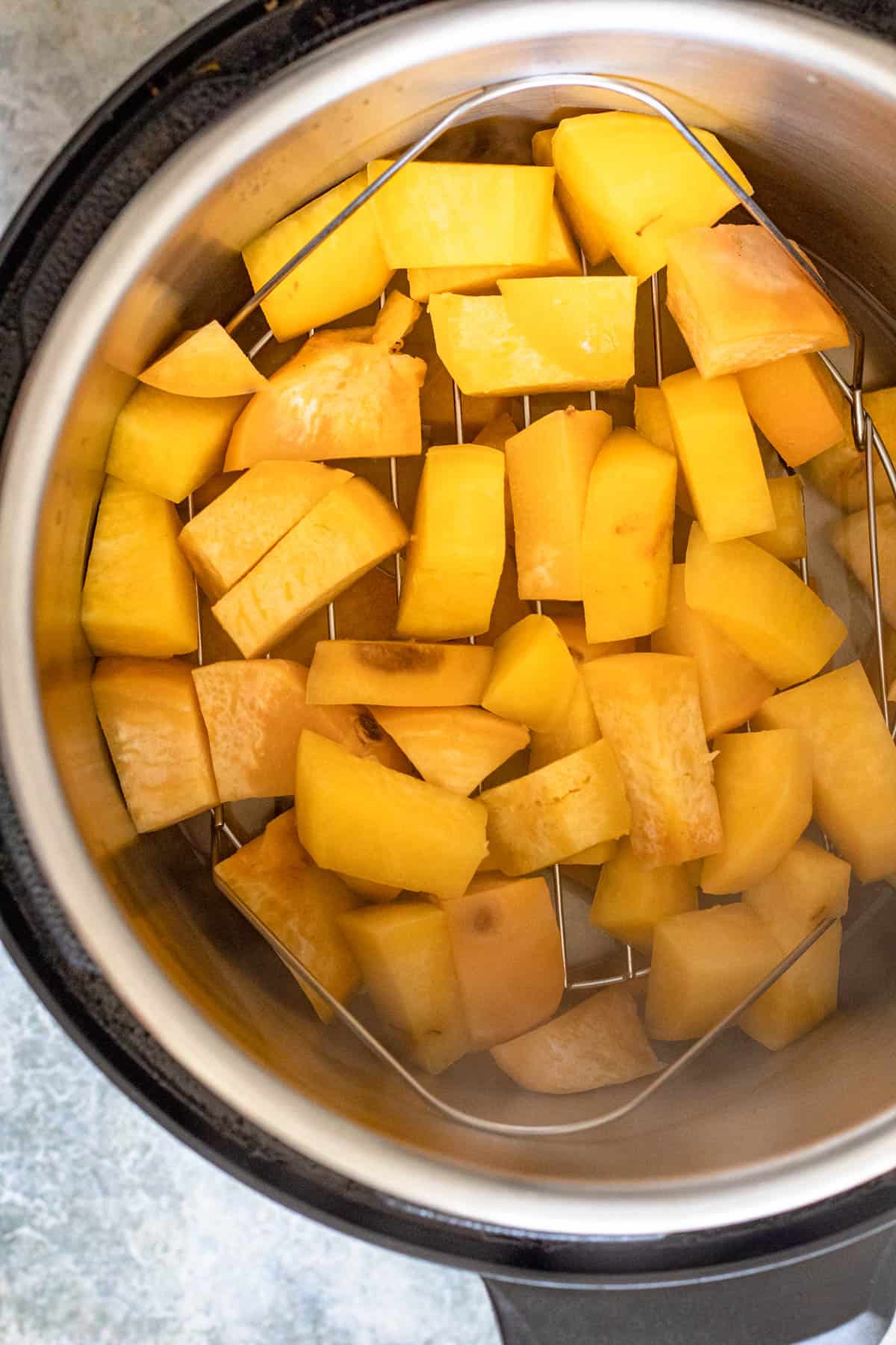 Top view of cooked rutabaga inside the Instant Pot. 