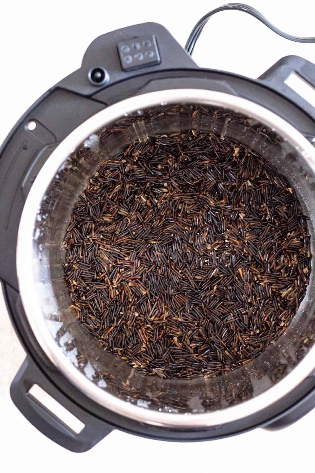 Top view of the wild rice in the instant pot.