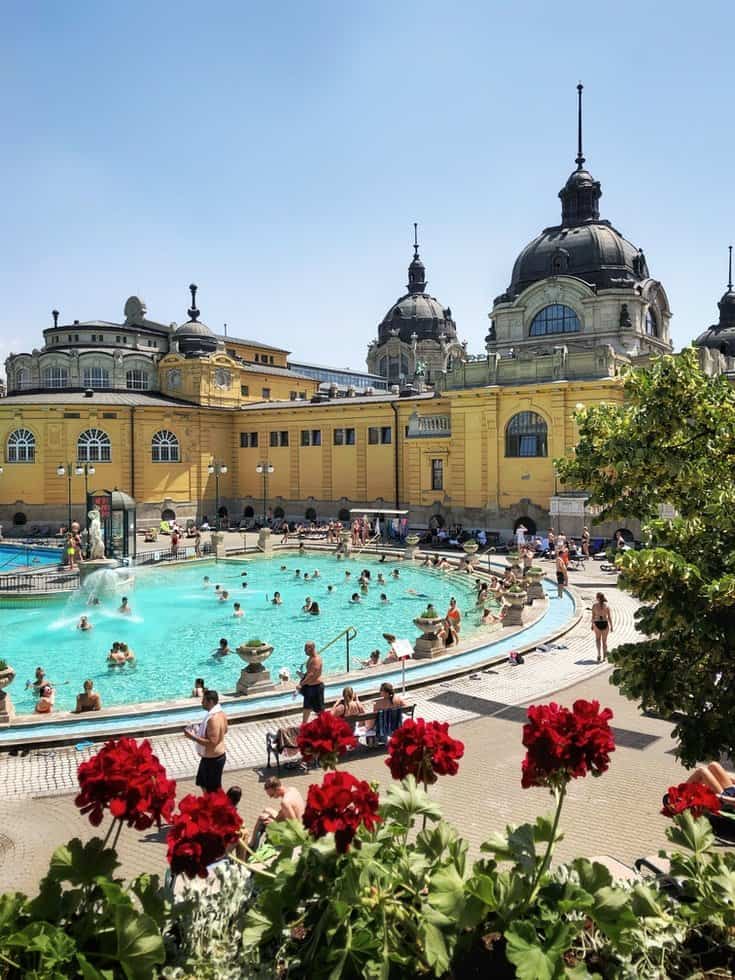 Thermal spa filled with people in Budapest, Hungary. 