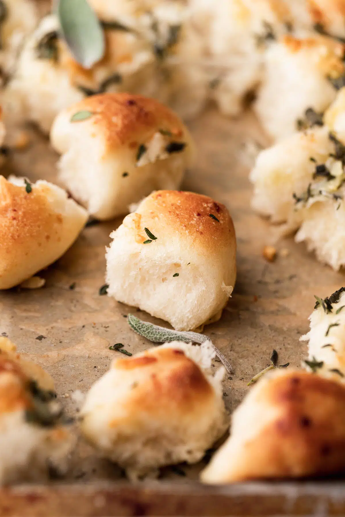 Parmesan bread bites with parsley sprinkled over the top. 