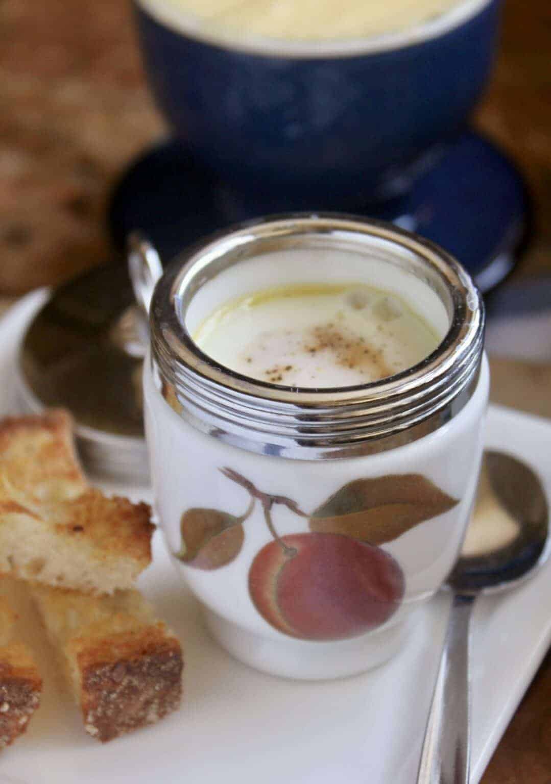 Coddled eggs in a coffee mug. 
