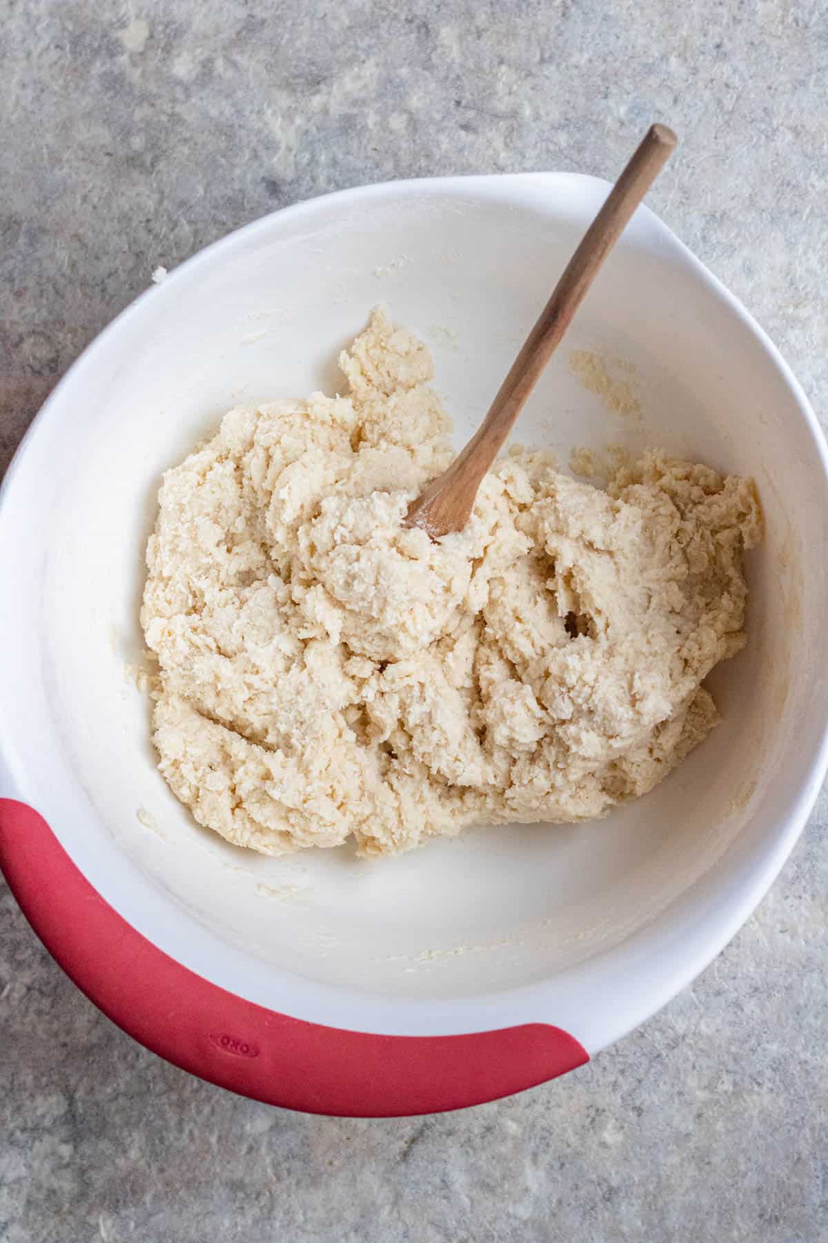 Dough prepared for johnny cake in a mixing bowl. 
