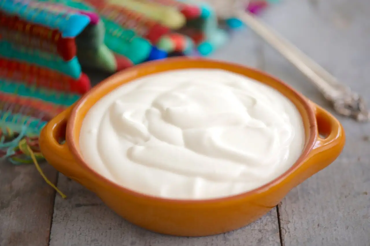 Homemade sour cream in a small dish. 