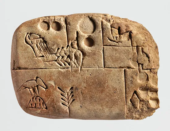 Cuneiform tablet with writing on it. 