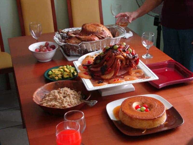 A table set with traditional Puerto Rico Thanksgiving dishes. . 