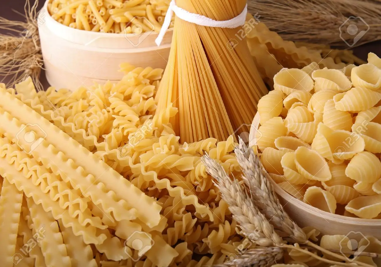 Variety of dry pasta shapes. 
