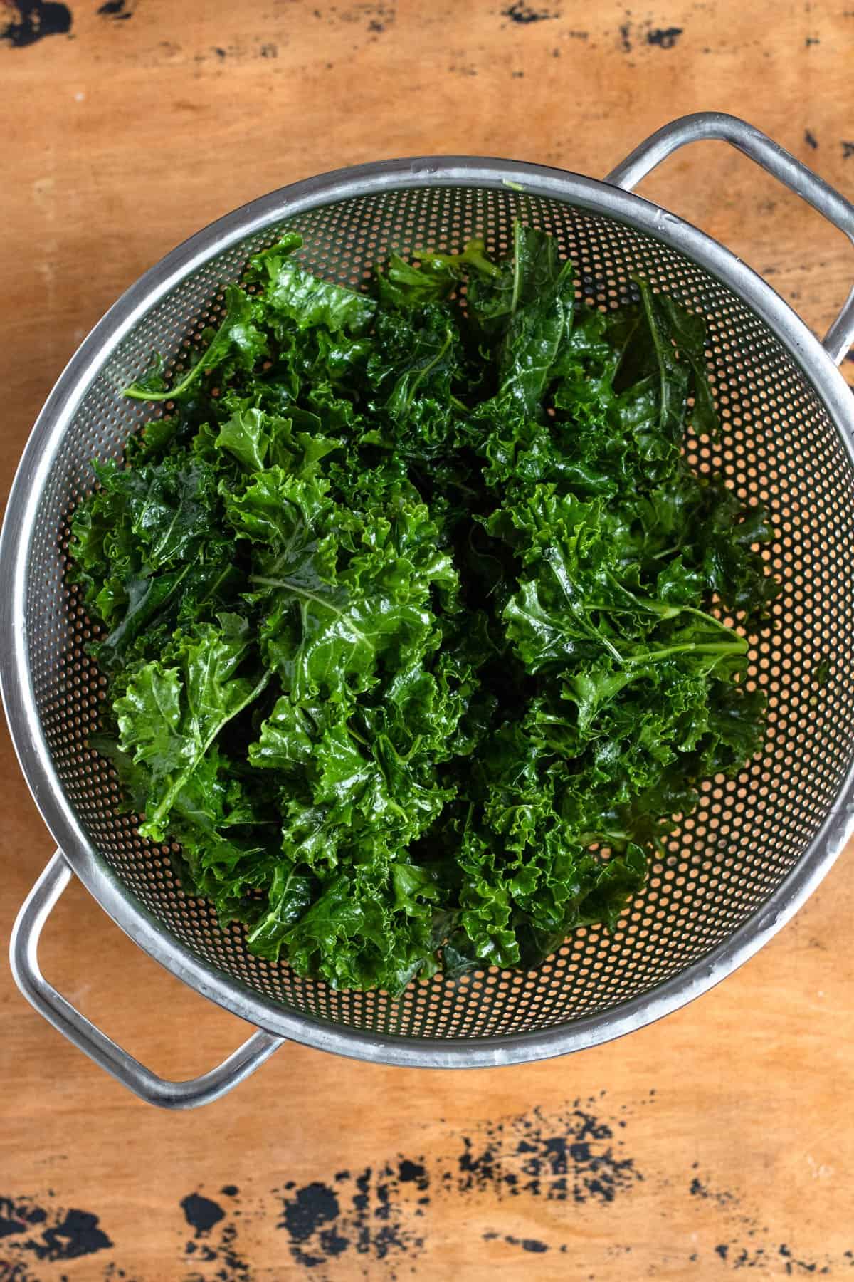 Kale draining in a colander. 