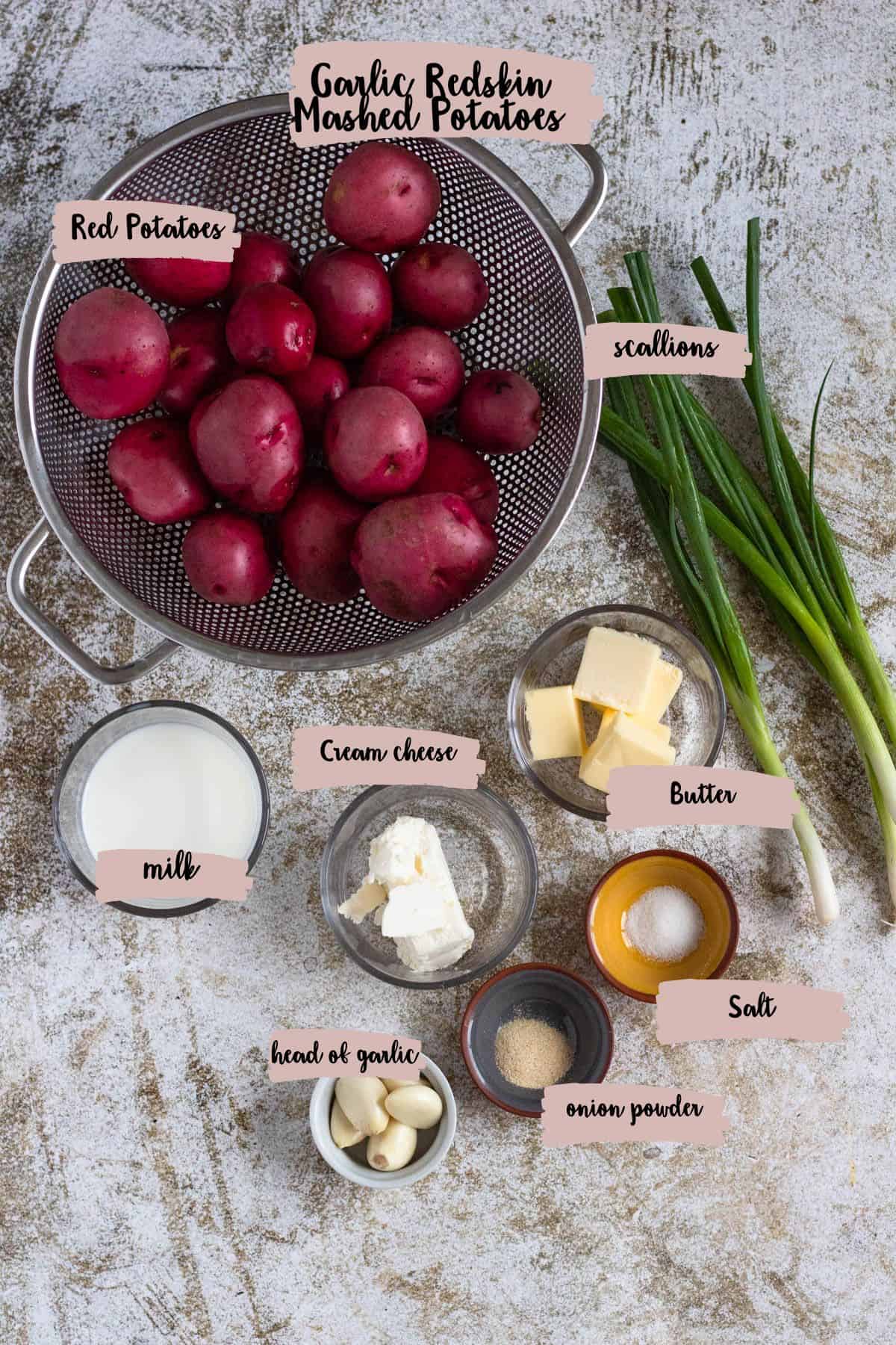 Ingredients shown that are needed to prepare garlic redskin mashed potatoes. 