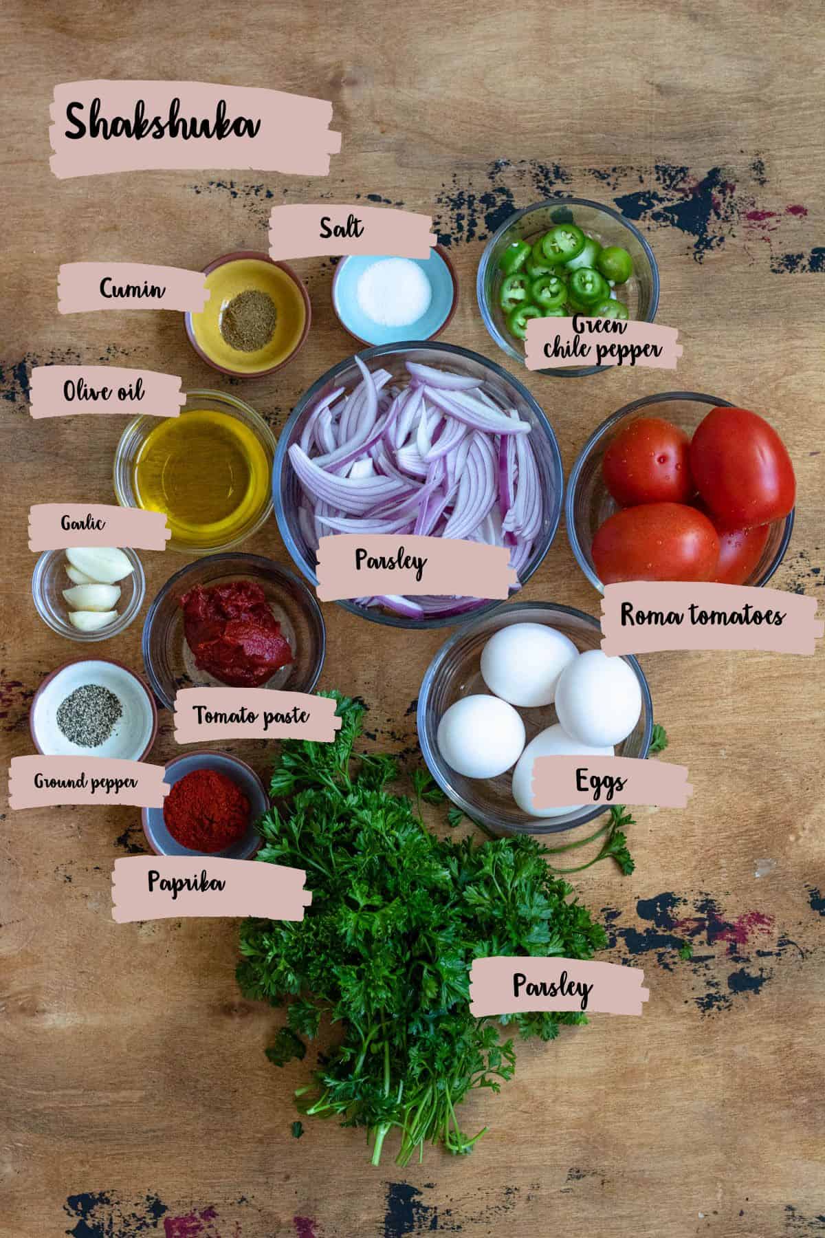 Ingredients shown that are needed to prepare shakshuka recipe. 
