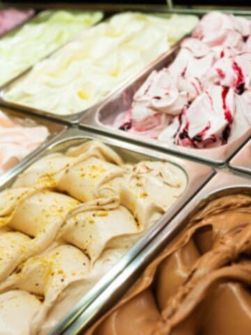 Gelato in ice cream serving containers.
