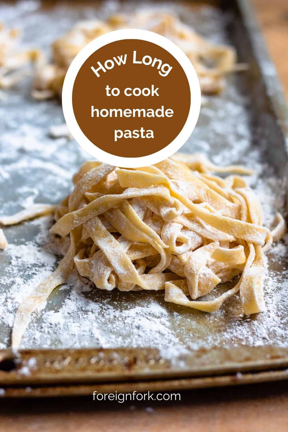 Pinterest pin image of freshly made homemade pasta with text overlay how long to cook homemade pasta. 