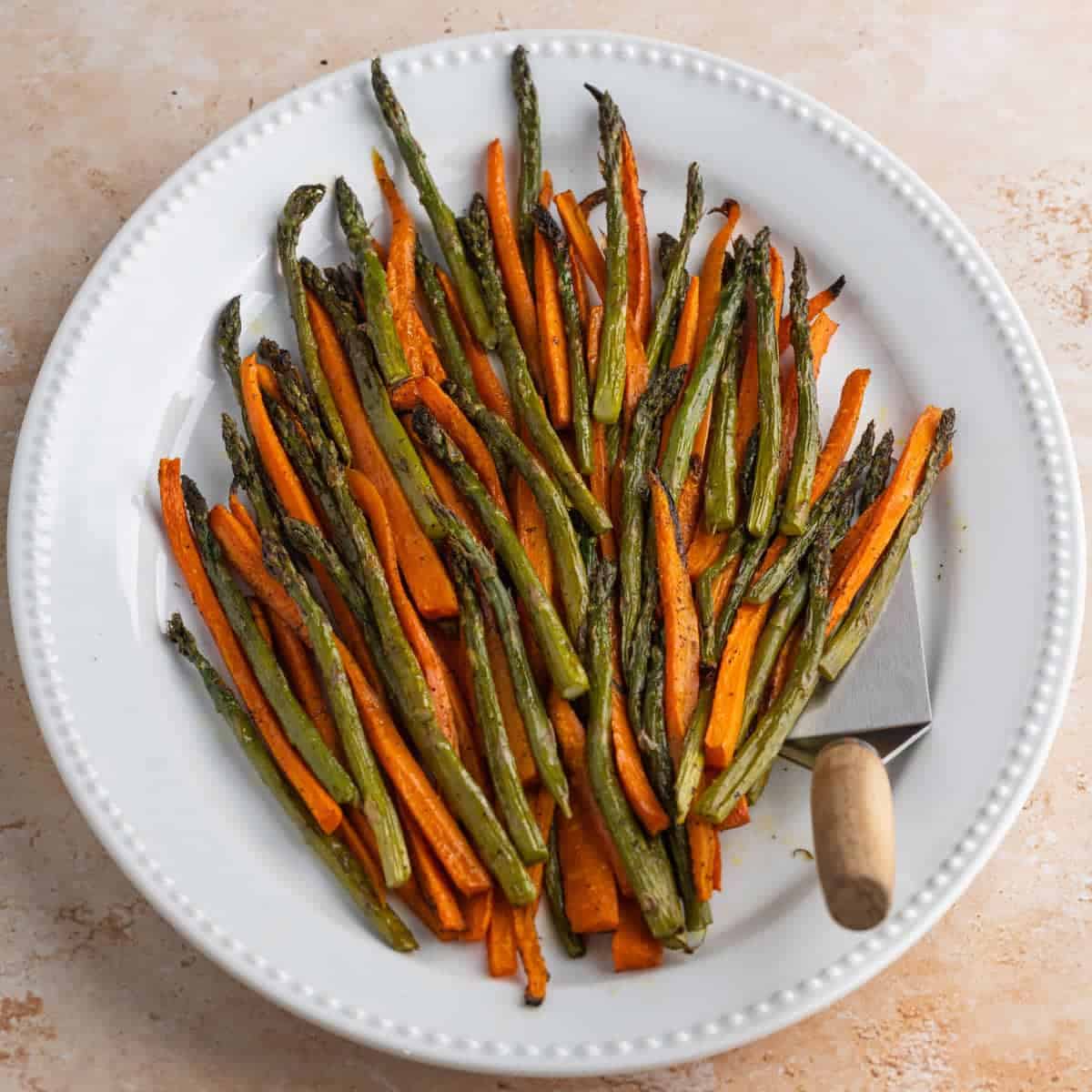 Plateful of roasted asparagus and carrots. 