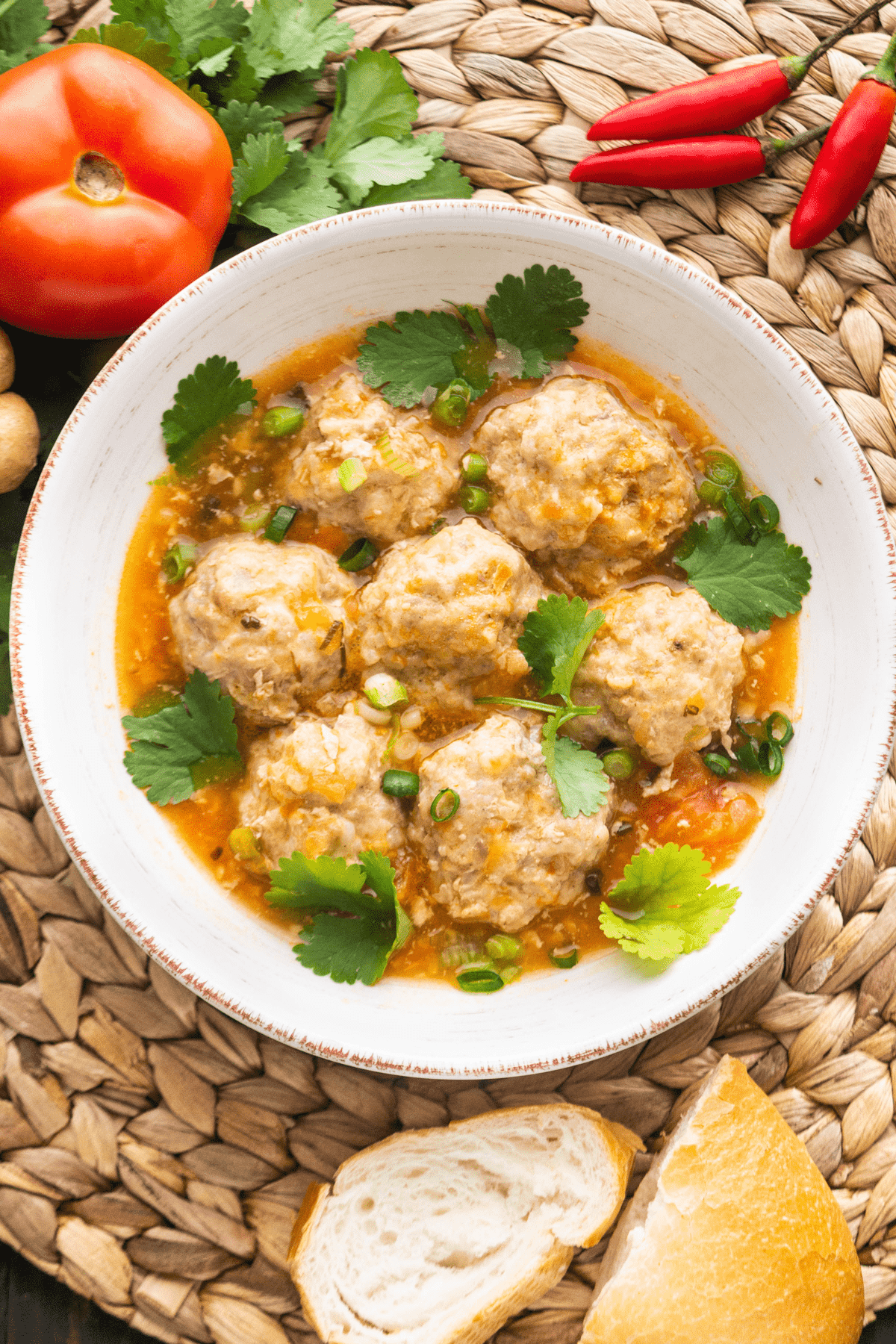 Vietnamese Meatballs in tomato sauce served in a bowl. 