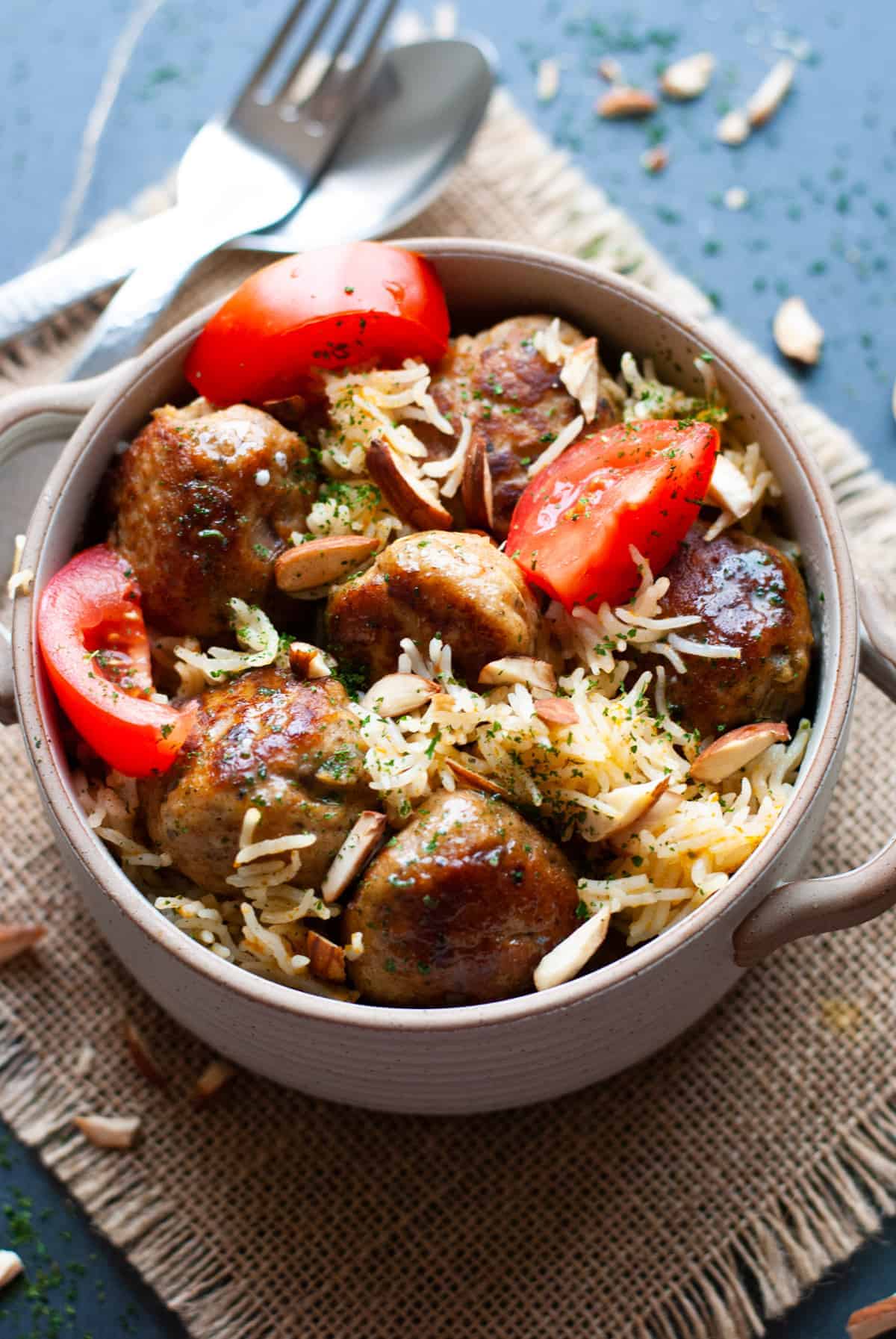 Chicken meatballs and rice in a bowl. 