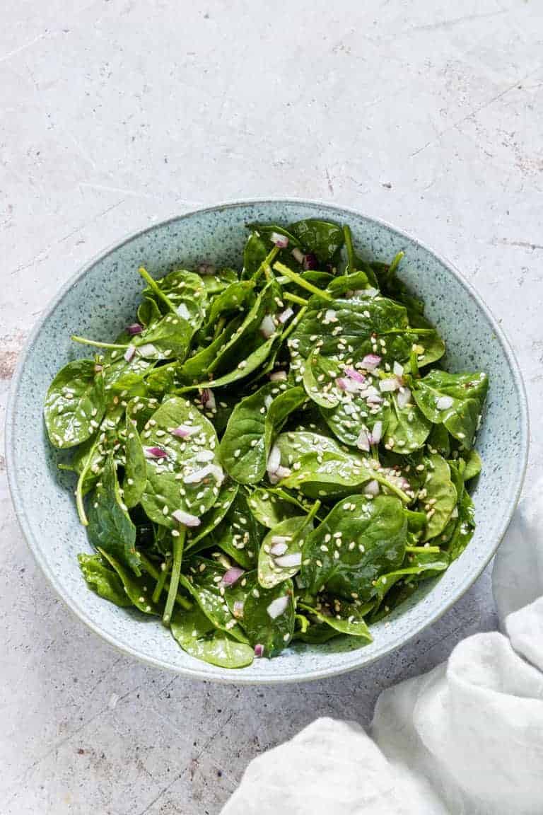 Sesame spinach salad in a bowl. 