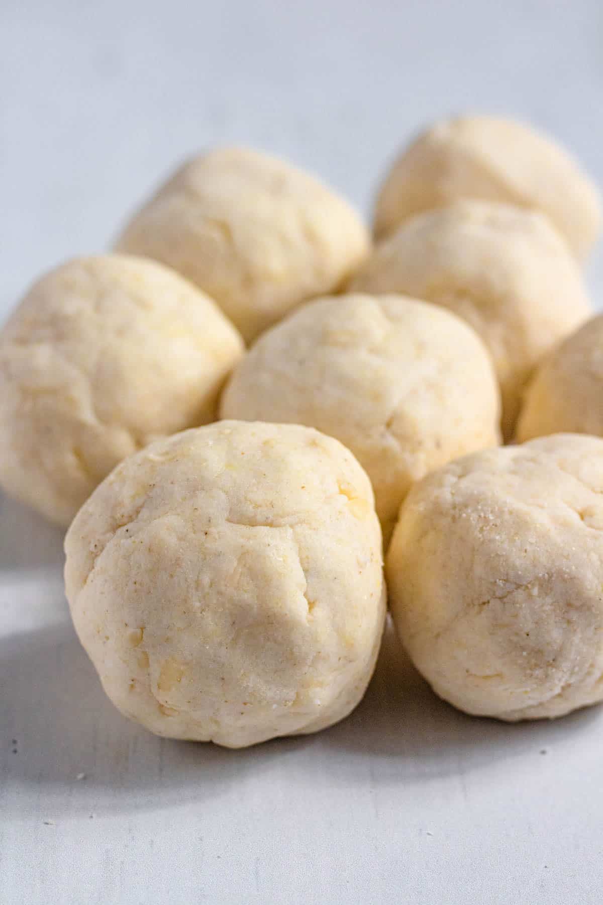Arepa dough formed into balls.